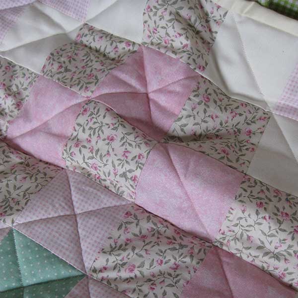 Ditsy pink quilt